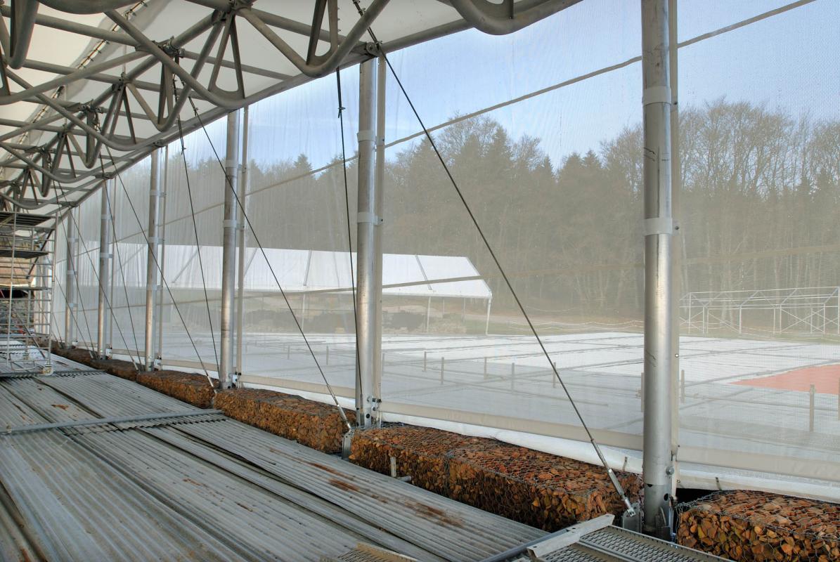 Fermeture latérale et lests en gabions